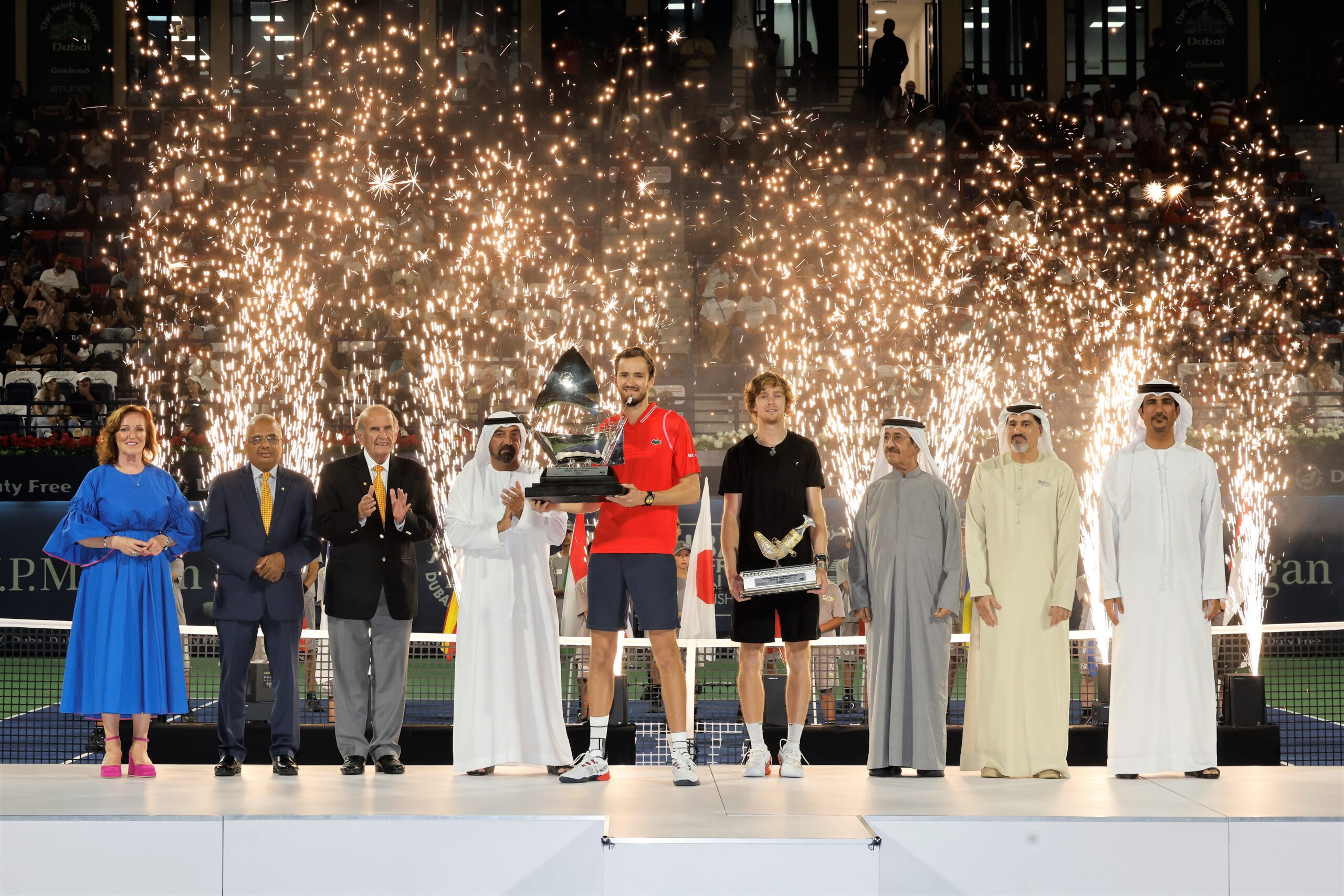 Dubai, UAE, 4th.March, 2023. Russian tennis players at the trophy  presentation, Winner Daniil Medvedev (red shirt) and runner-up Andrey  Rublev at the Dubai Duty Free Tennis Championships tournament at Dubai Duty  Free