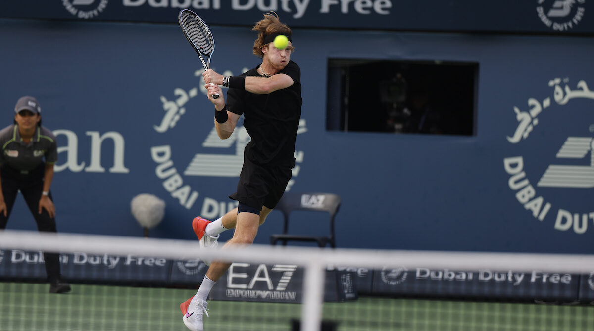 DUBAI, UAE, 4th March 2023. 2022 champion Andrey Rublev in action during  the men's singles final of the Dubai Duty Free Tennis Open Championships.  3rd seed Daniil Medvedev defeated Rublev 6-2, 6-2