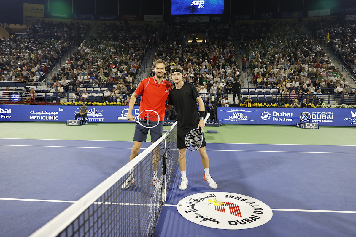 Dubai, UAE, 4th.March, 2023. Russian tennis players at the trophy  presentation, Winner Daniil Medvedev (red shirt) and runner-up Andrey  Rublev at the Dubai Duty Free Tennis Championships tournament at Dubai Duty  Free