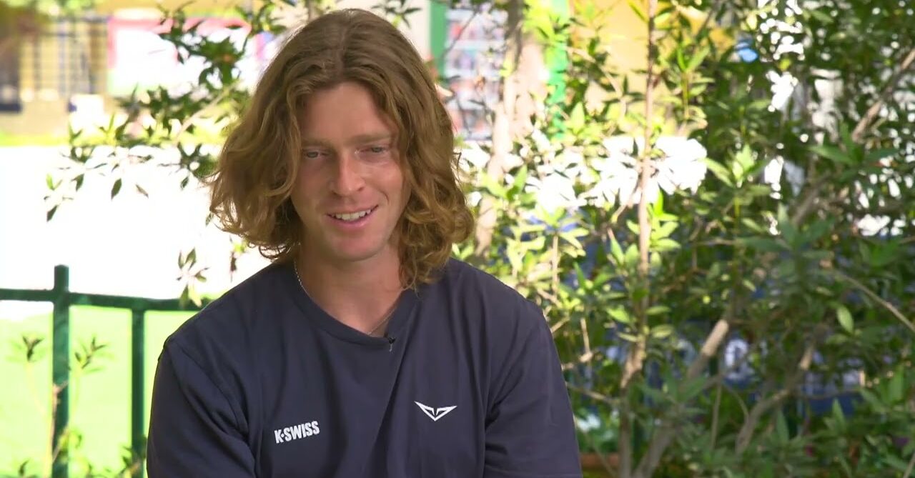 ATP player smiling during an outdoor interview