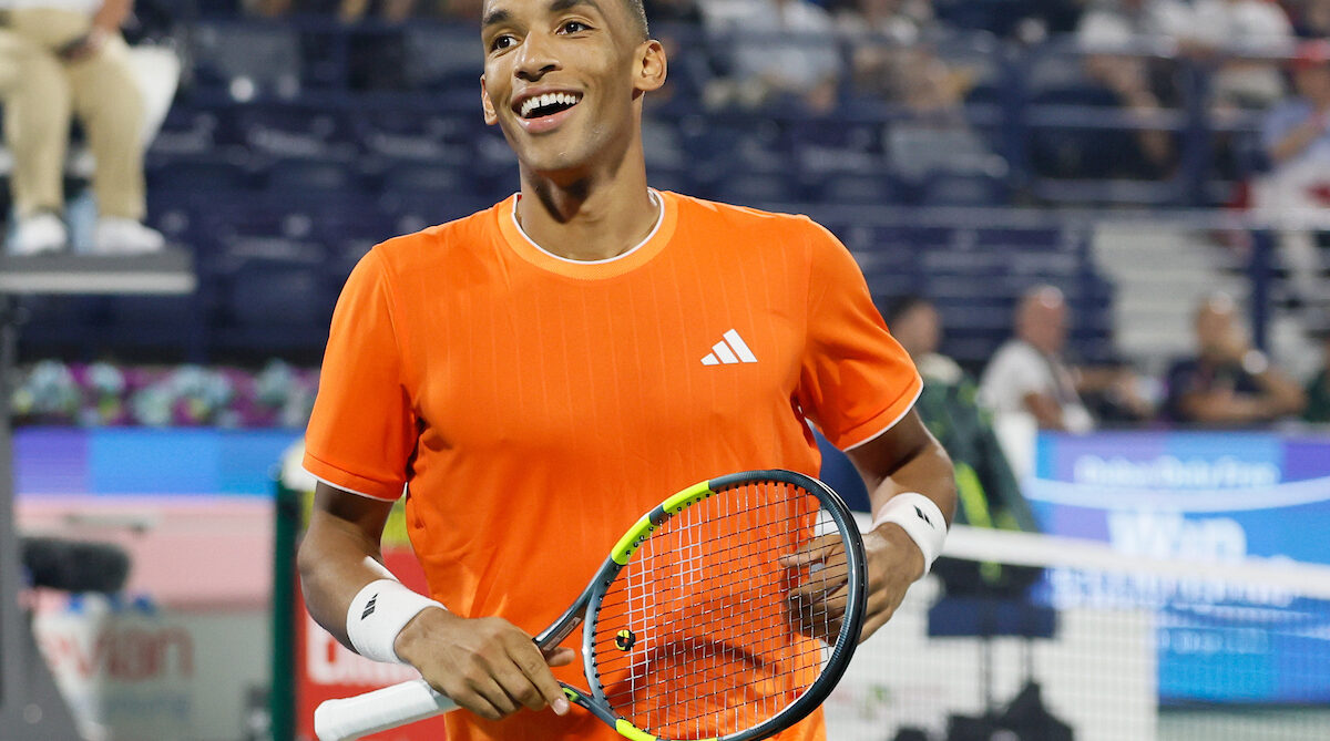 Zhizhen Zhang of China in action against Felix Auger-Aliassime of Canada in the ATP Dubai Duty Free Tennis Championships 23rd February, 2026.