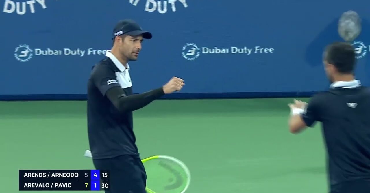 ATP doubles players first bump on court