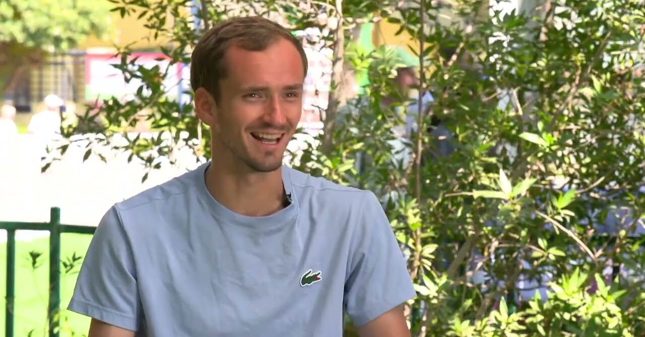 ATP player smiling during outdoor interview