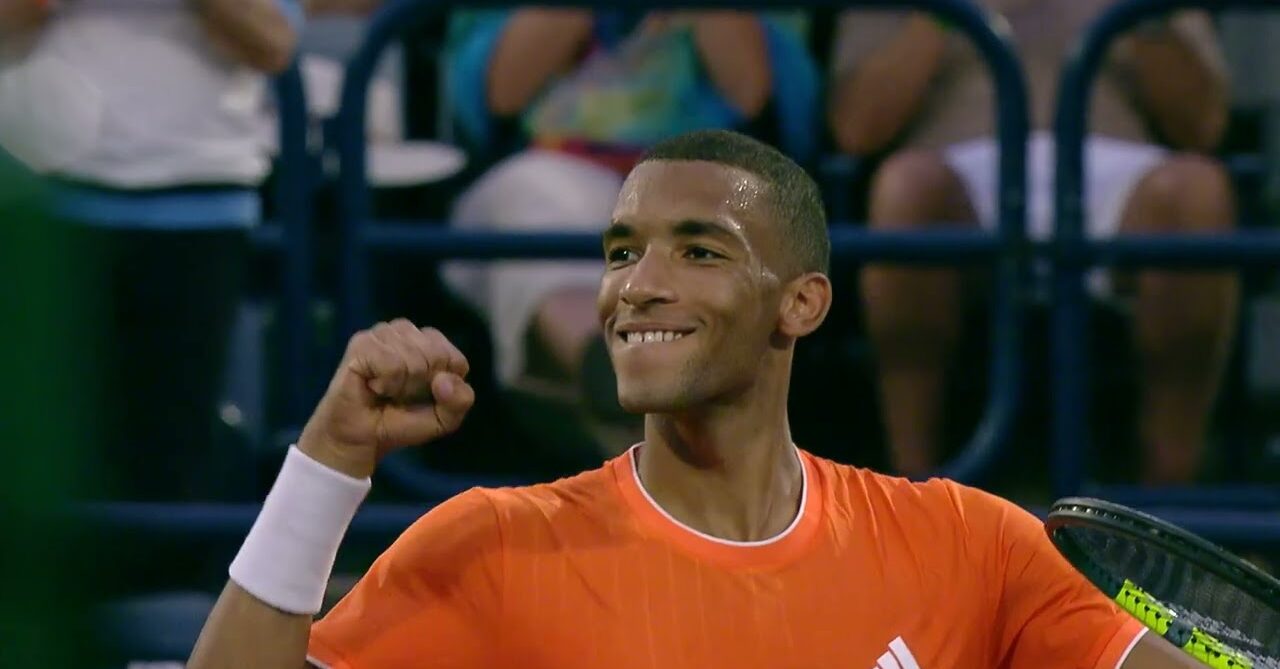 ATP player smiles on court