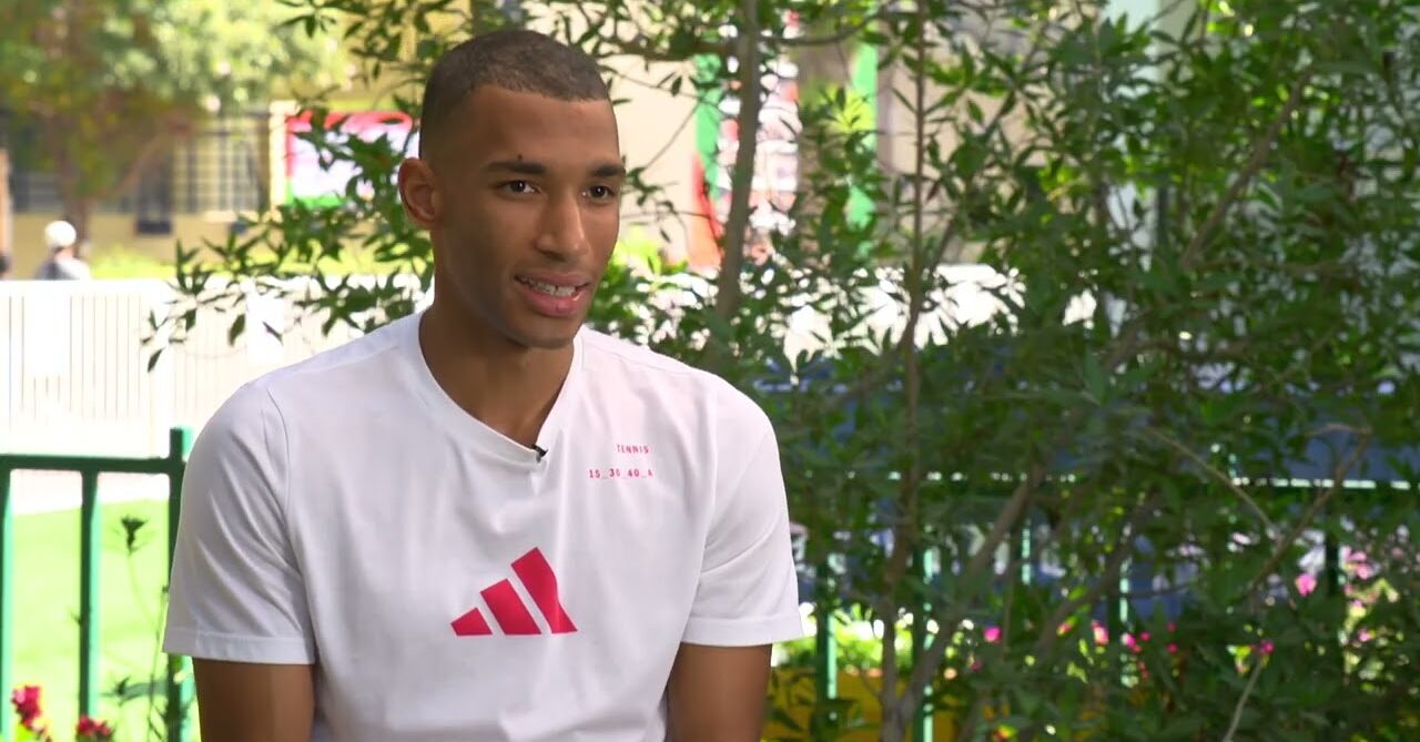 ATP player sitting outside during an interview