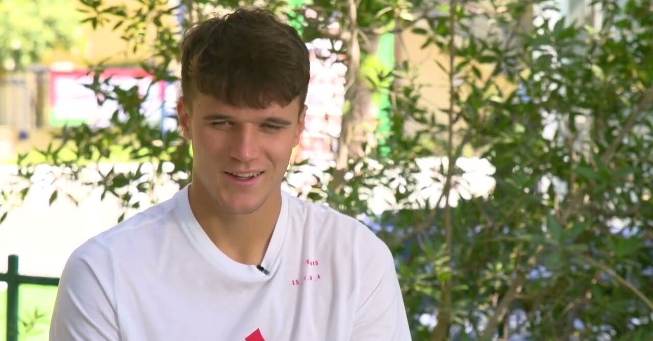 ATP player in white tee shirt during interview