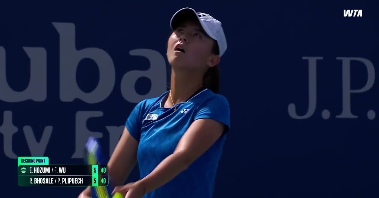 WTA player preparing to serve