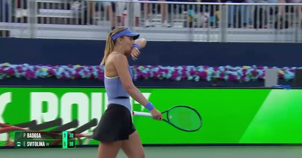 WTA player walking across court