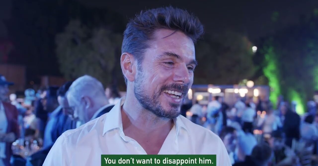 ATP player smiles during nighttime interview