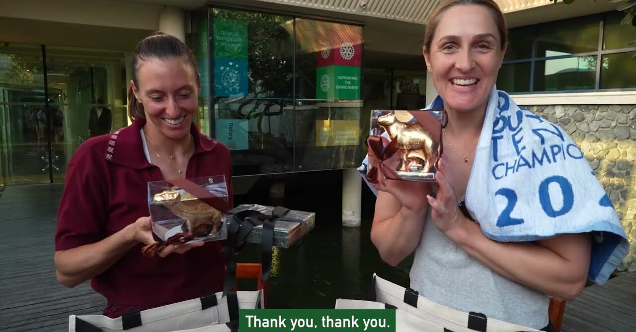 Gabriela Dabrowski and Luisa Stefani show off their player gift bag for winning the WTA doubles championships at the 2026 Dubai Duty Free Championships