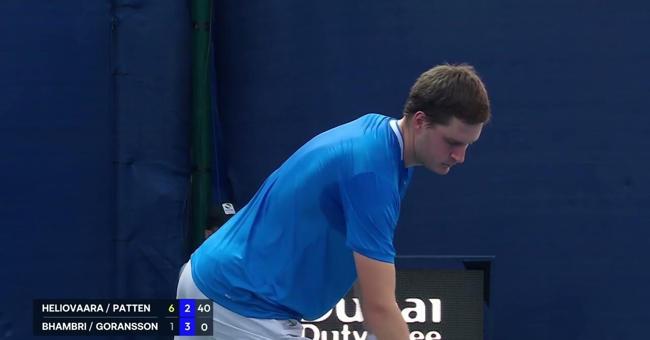 Henry Patton about serve in a round 1 double match at the 2026 Dubai Duty Free Championship