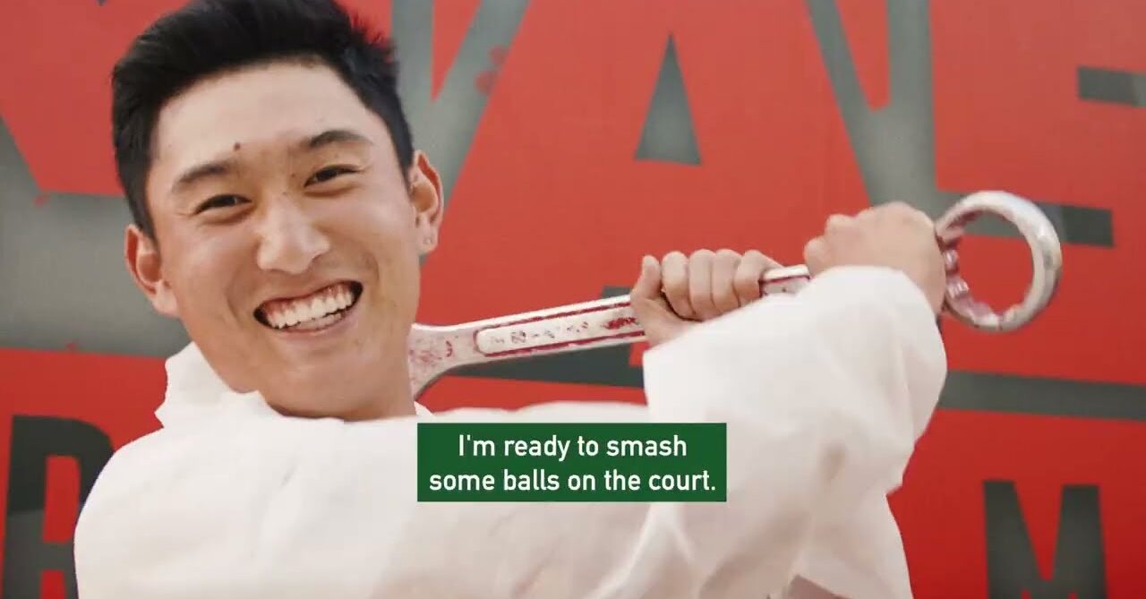Shang Juncheng playfully gets ready to smash things at the Smash Room event for the 2026 Dubai Duty Free Tennis Championship