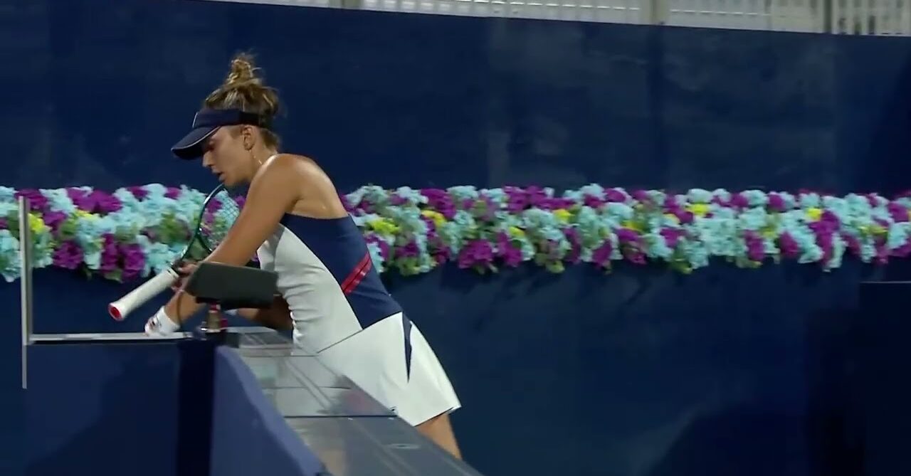 WTA tennis player preparing to go on court