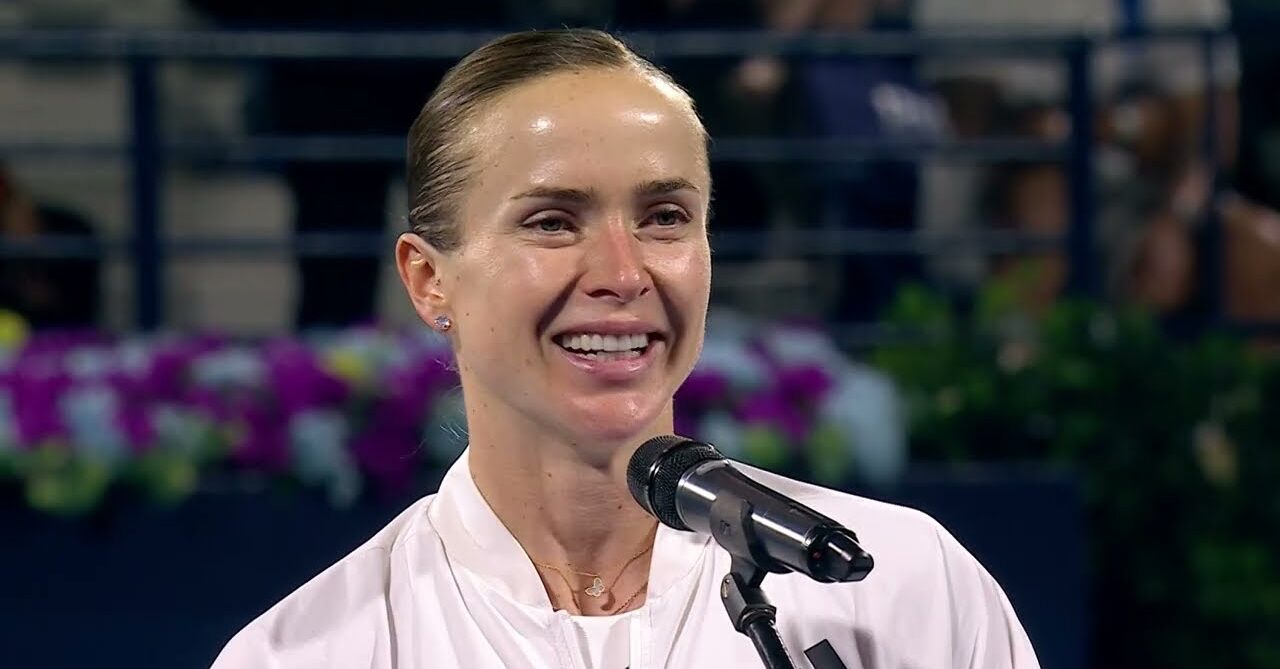 Elina Svitolina speaks at a microphone