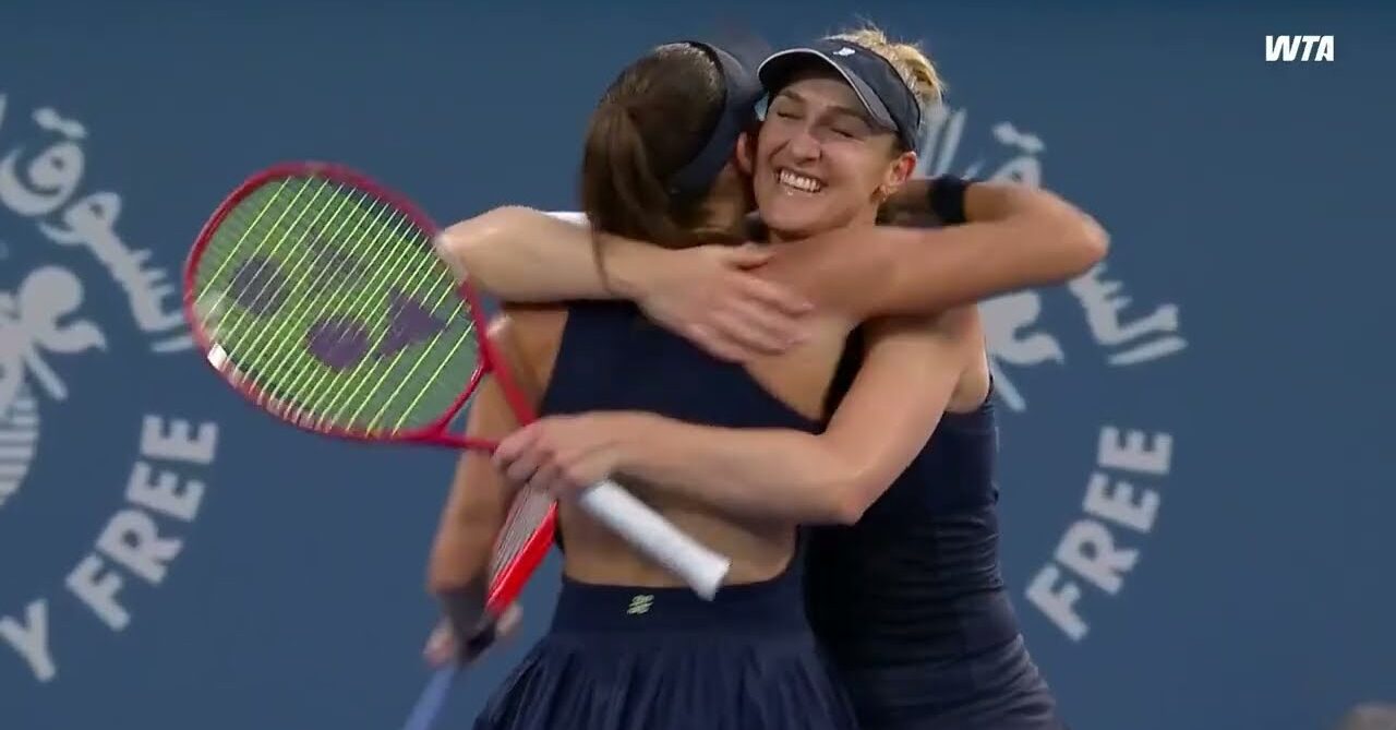 Dabrowski and Stefani embrace after winning the Dubai Duty Free Tennis Championship Doubles Final